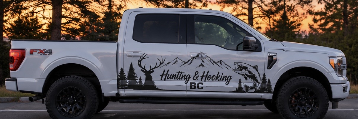 White F-150 with the Hunting and Hooking BC deer, mountains, and fish decal